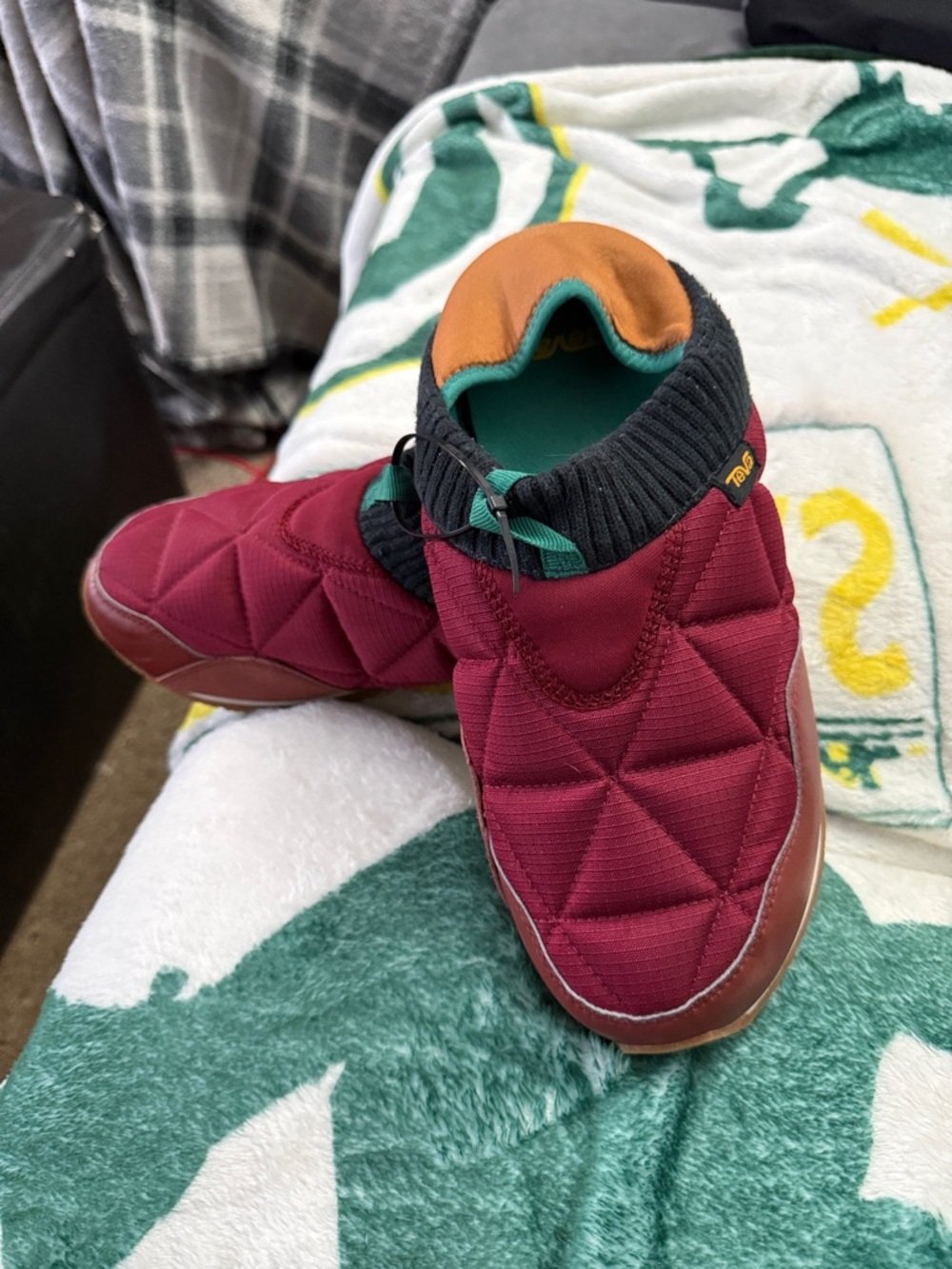 Teva adults size 10  Burgundy Slip-On Shoes with Black Collar
